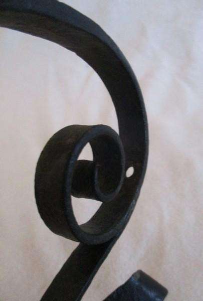 Three vintage black metal wall mount open scroll shaped hanging brackets