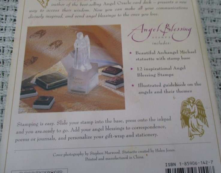 A box of twelve Angel blessing rubber stamps  with Archangel Michael base/applicator