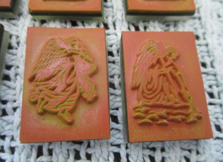 A box of twelve Angel blessing rubber stamps  with Archangel Michael base/applicator
