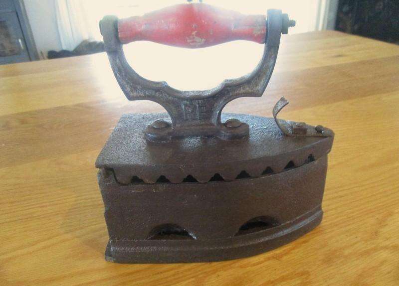 Rare heavy antique 1920's Reliable Foundry, Canada cast iron hot coal iron - great doorstop!