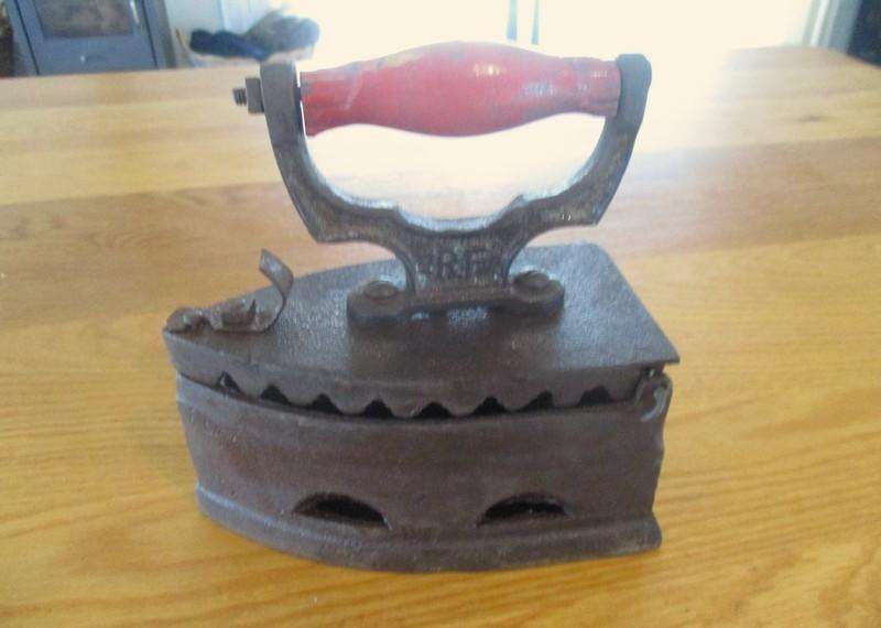 Rare heavy antique 1920's Reliable Foundry, Canada cast iron hot coal iron - great doorstop!