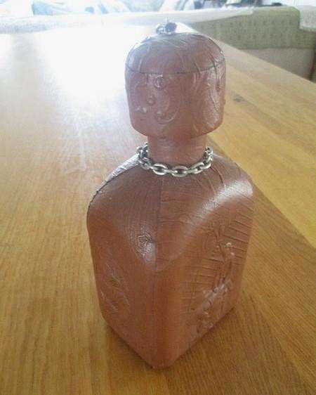 Two beautifully decorative Spanish hand made leather embossed decanters