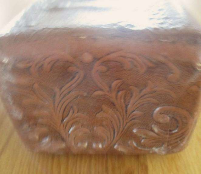 Two beautifully decorative Spanish hand made leather embossed decanters