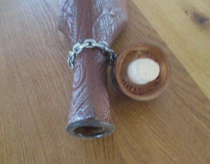 Two beautifully decorative Spanish hand made leather embossed decanters