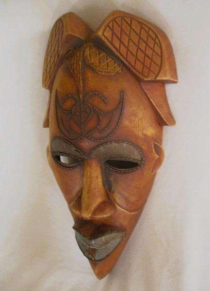 Large vintage hand carved wooden mask from Gabon with inlaid metal decorative detail