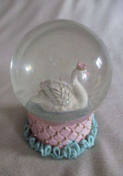 Glass Swan snow ball with pretty glittery "snow flakes"