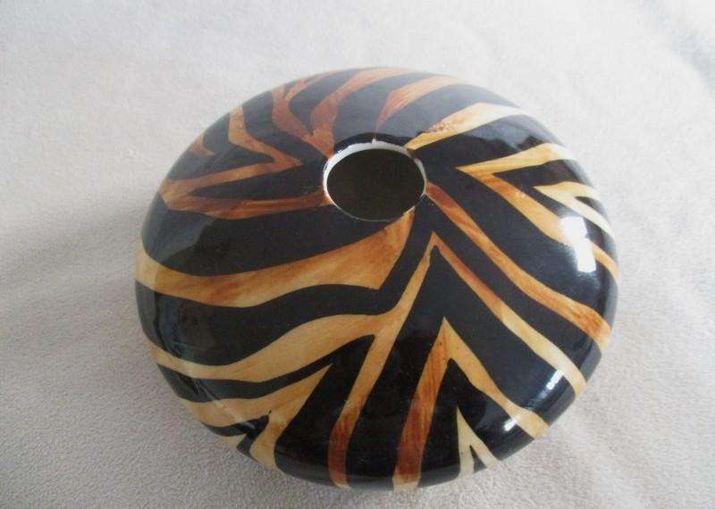 Three striking porcelain vases made in Cape Town