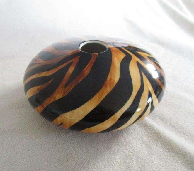 Three striking porcelain vases made in Cape Town