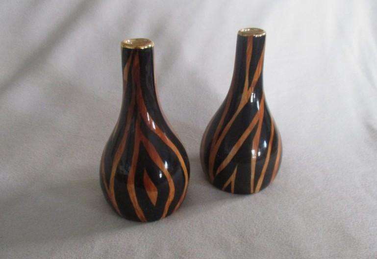 Three striking porcelain vases made in Cape Town