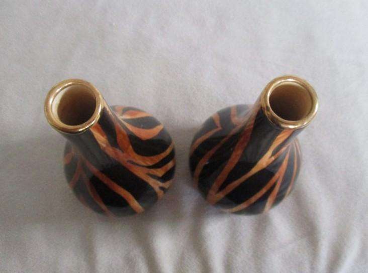 Three striking porcelain vases made in Cape Town