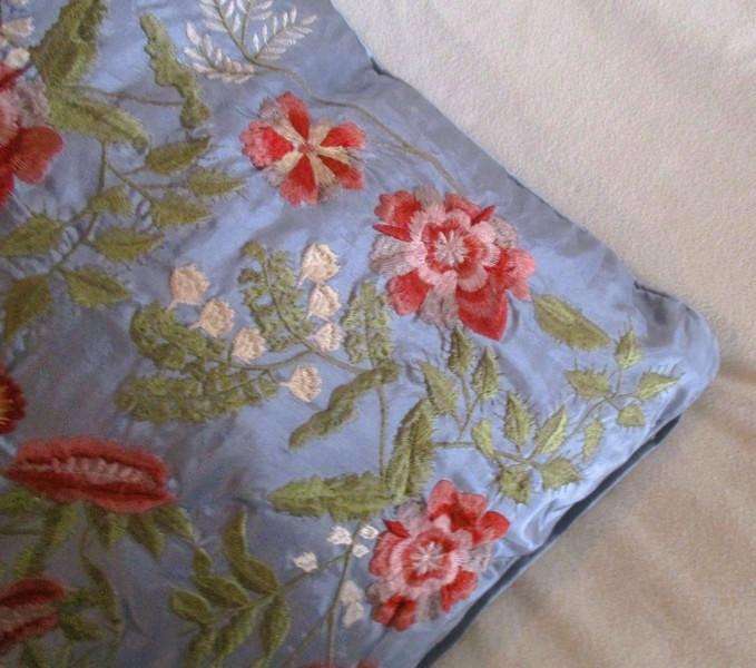 Stunning copiously embroidered duck egg blue cushion with floral design