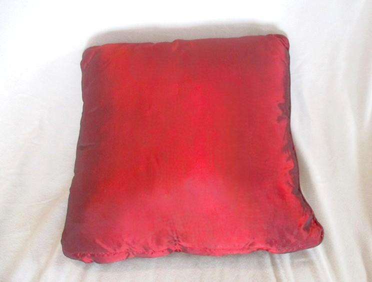 Stunning copiously embroidered ruby red cushion with floral design