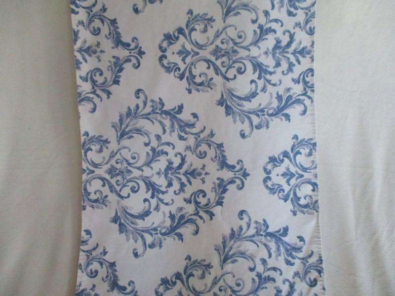 A lovely quality blue and white runner with interesting design