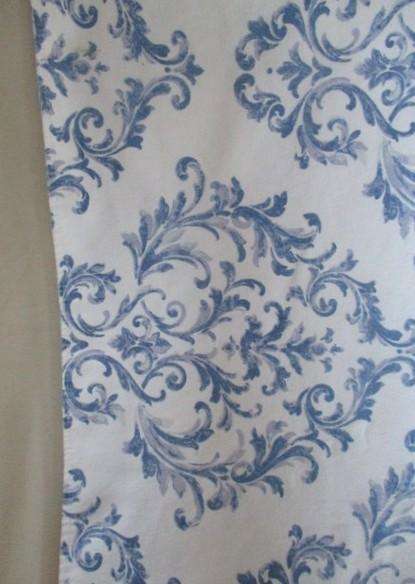 A lovely quality blue and white runner with interesting design