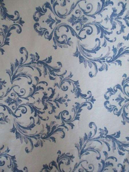 A lovely quality blue and white runner with interesting design