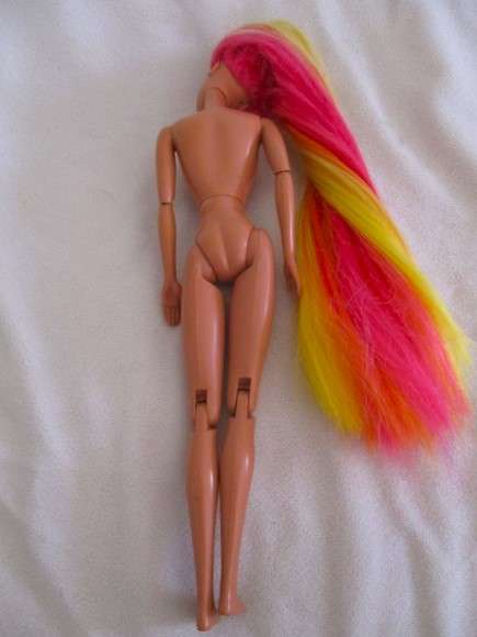 1990's articulated Mattel Barbie doll with very long, soft rainbow hair - Hula Barbie?