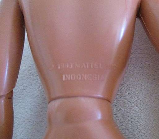 1990's articulated Mattel Barbie doll with very long, soft rainbow hair - Hula Barbie?
