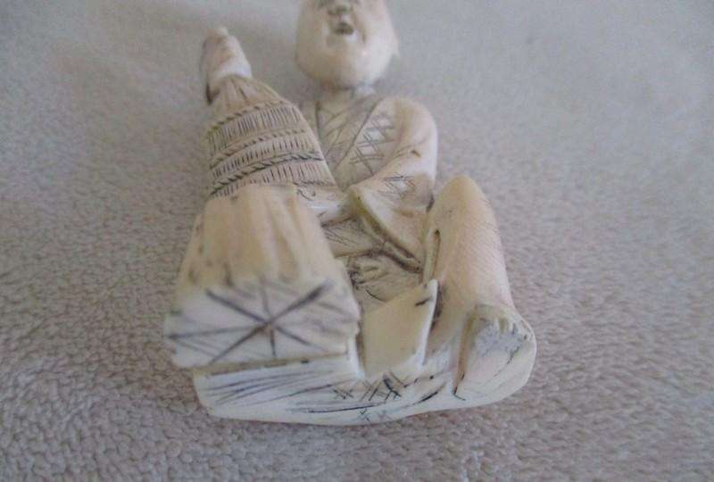 A batch of five small vintage bone/tusk, metal and ceramic Chinese collectables