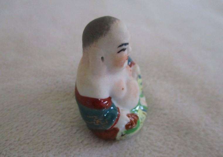 A batch of five small vintage bone/tusk, metal and ceramic Chinese collectables