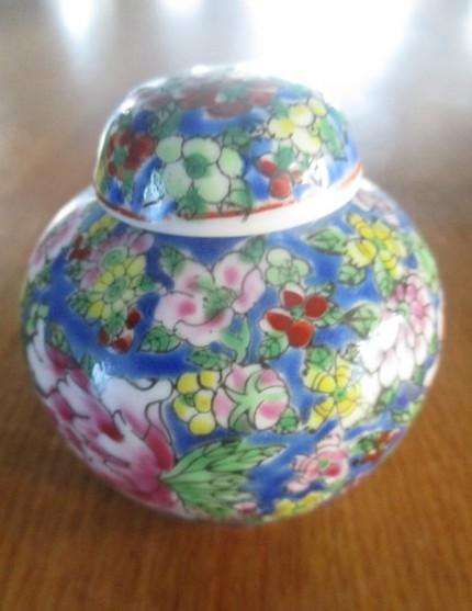 Two small exquisite vintage Chinese Famille Verte lidded ginger jars