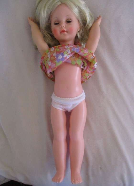 Vintage 1960's 48cm tall darling in "unplayed with" condition - original clothes. Marked SAD