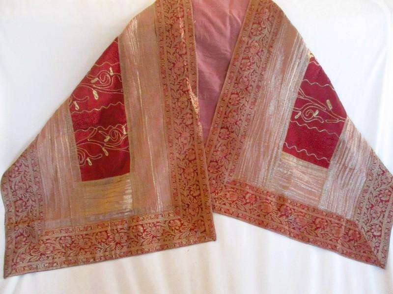 A good quality embroidered and lined wine red and gold cloth/runner made in India