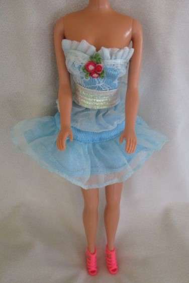 Vintage 1980's/90's Mattel Barbie doll with tight blonde curls - knees that bend