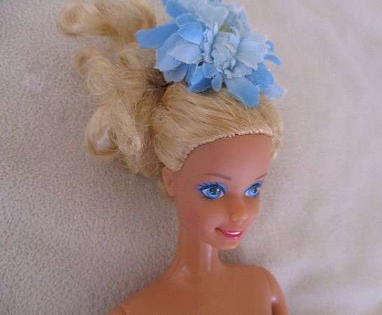 Vintage 1980's/90's Mattel Barbie doll with tight blonde curls - knees that bend
