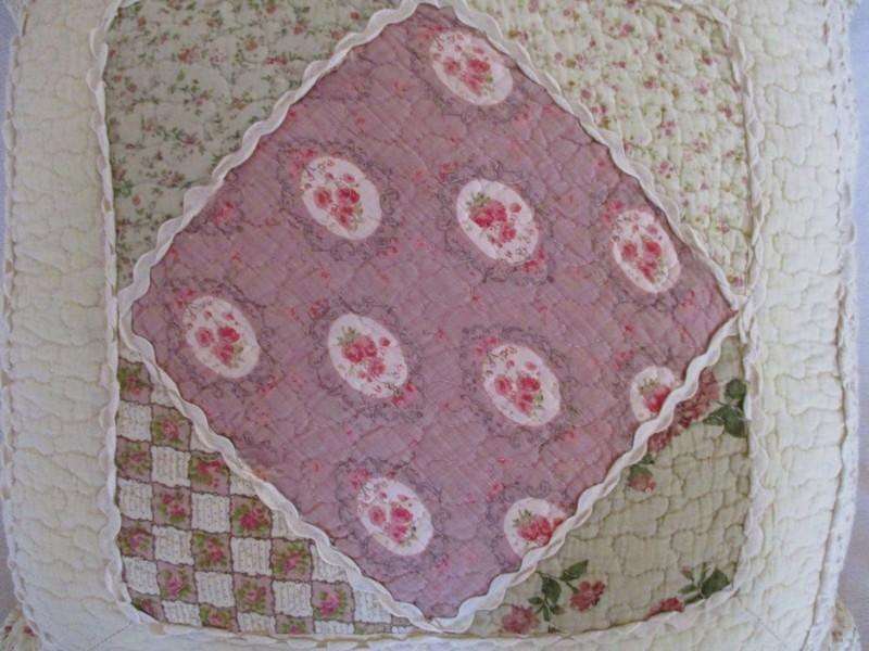 A beautiful quilted cushion in great condition