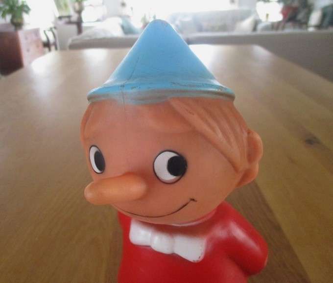 Adorable vintage firm rubber Pinocchio savings bank