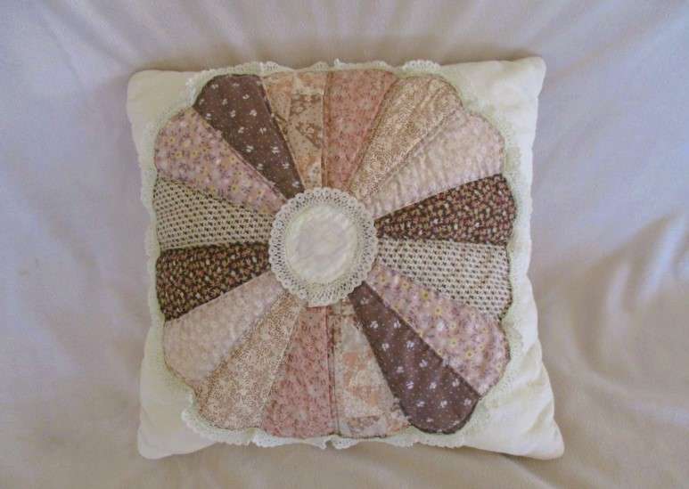 A smaller size vintage patchwork cushion in great condition