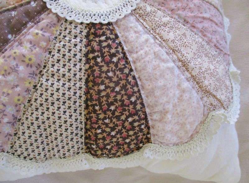 A smaller size vintage patchwork cushion in great condition