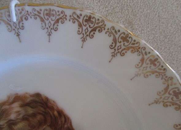 2. Two vintage porcelain display plates of two Victorian young girls -  with hangers