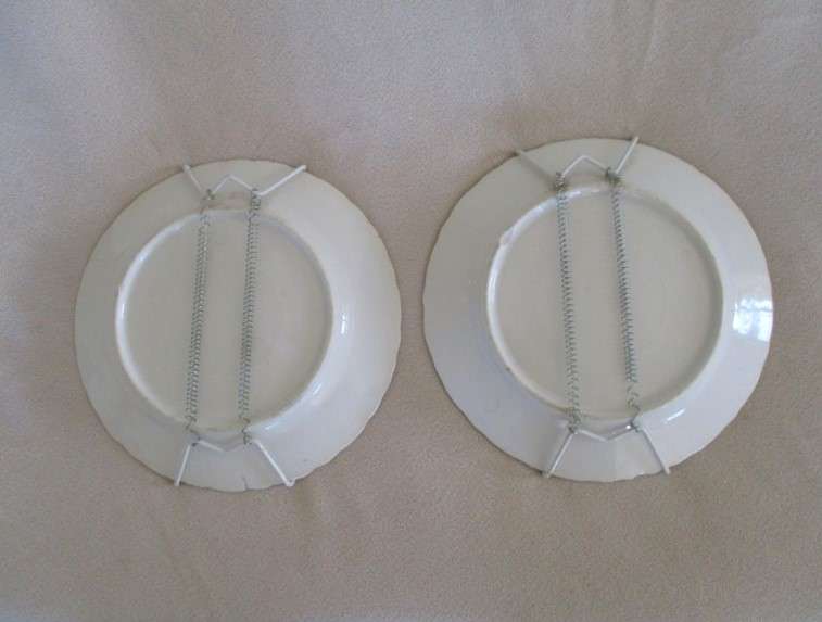 2. Two vintage porcelain display plates of two Victorian young girls -  with hangers