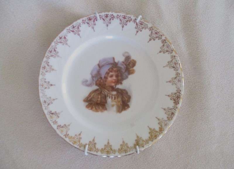 1. Two vintage porcelain display plates of two Victorian young ladies - with hangers