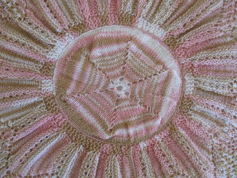 lovely hand crocheted cloth in pretty pastel colours