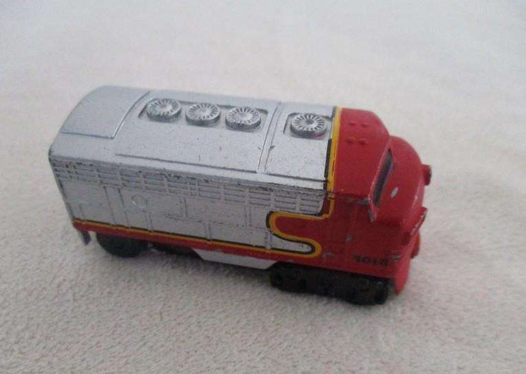 A batch of six small Die Casts - four New-Ray locomotives plus Hot Wheels Ratmobile and Wheel Loader