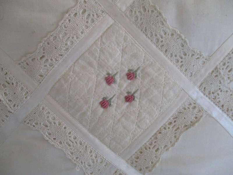 A pretty cushion with lace and ribbon detail