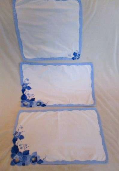 Two rectangular and one square vintage appliqued and embroidered cloths with beautiful water lilies