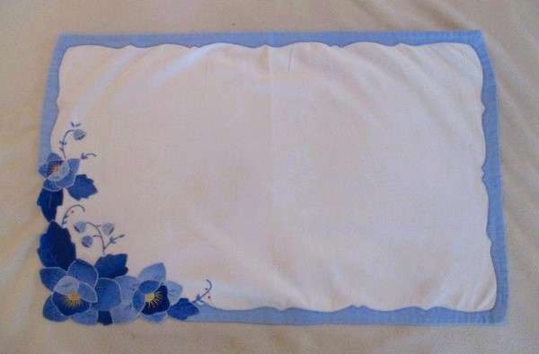 Two rectangular and one square vintage appliqued and embroidered cloths with beautiful water lilies