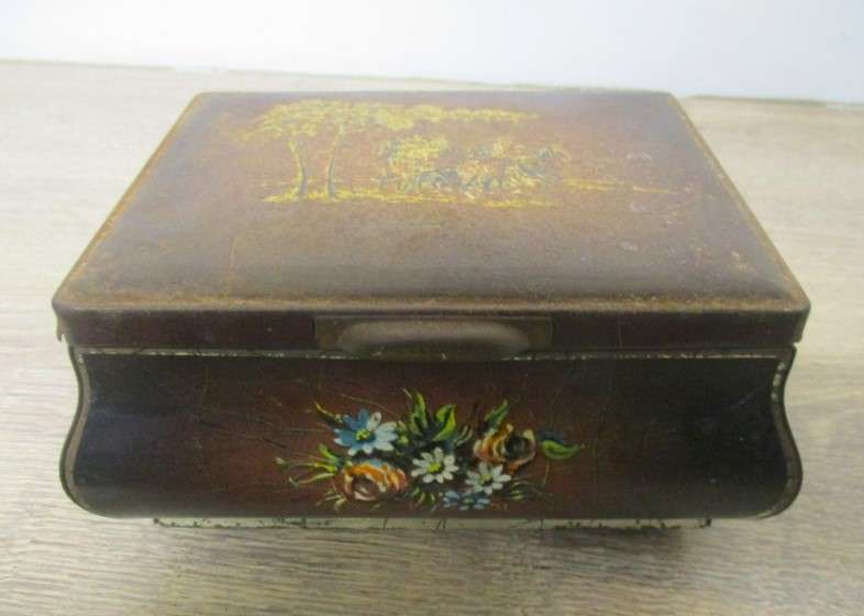 An old tin full of old Chinese, South African R1, 5c and 1/2 c coins and other countries' coins