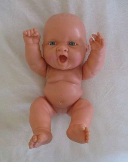 Such a happy, chubby, anatomically correct baby girl!