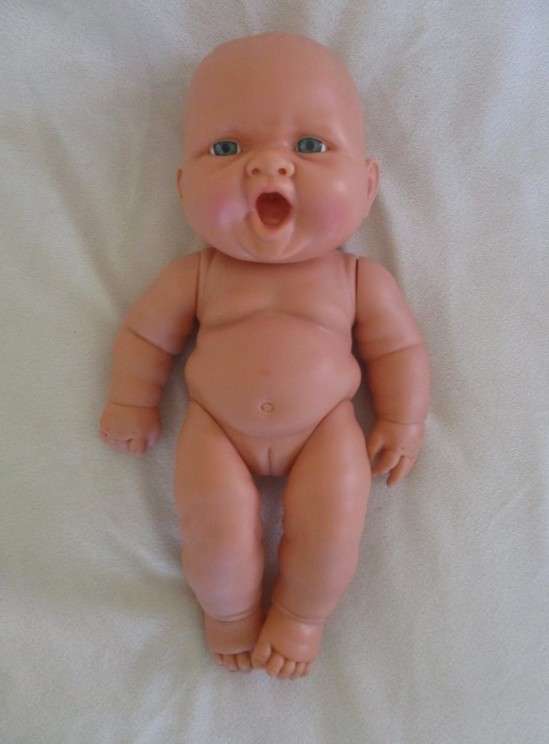 Such a happy, chubby, anatomically correct baby girl!