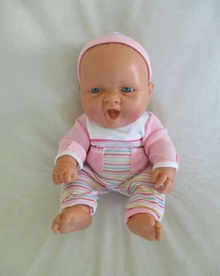 Such a happy, chubby, anatomically correct baby girl!