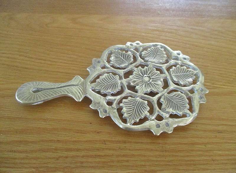 For Regina only - A heavy vintage solid brass trivet/pot stand with ornate floral and foliage design