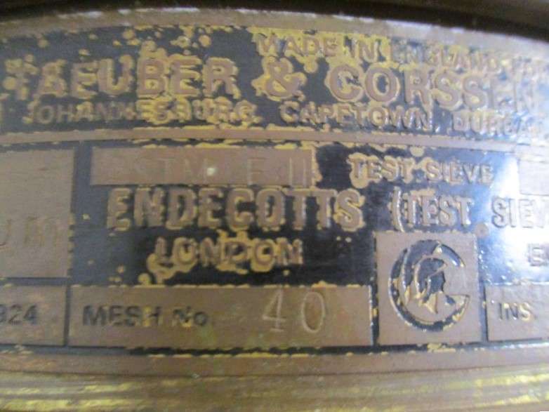 A very old antique gold panning sieve made in England