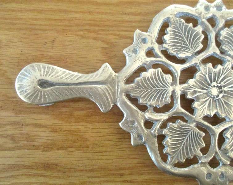 For Regina only - A heavy vintage solid brass trivet/pot stand with ornate floral and foliage design