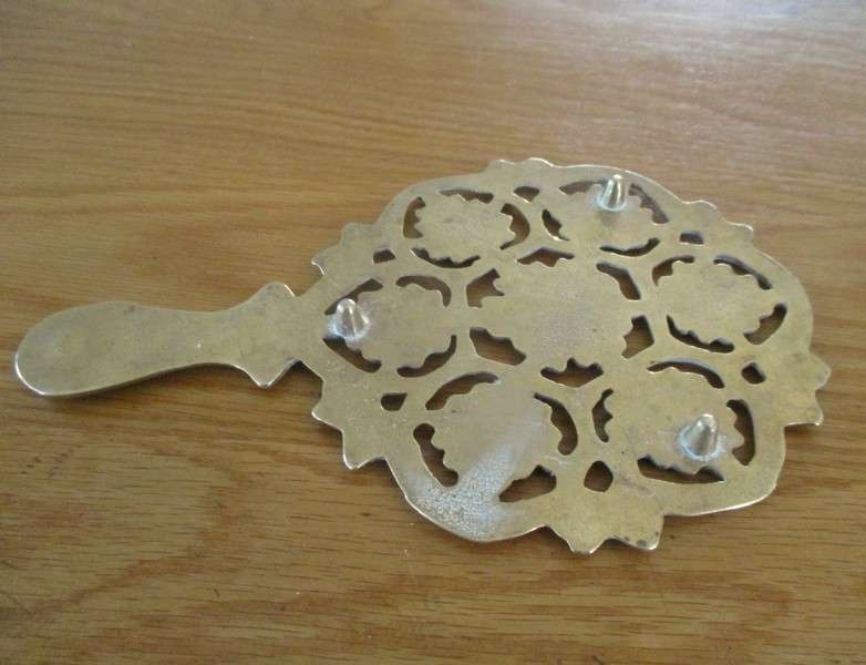 For Regina only - A heavy vintage solid brass trivet/pot stand with ornate floral and foliage design