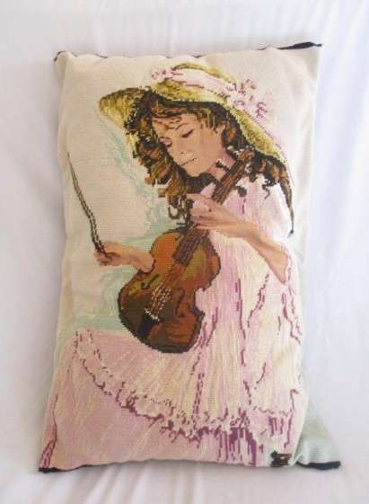 A large hand made cushion combining Petit Point and ordinary tapestry - girl playing violin