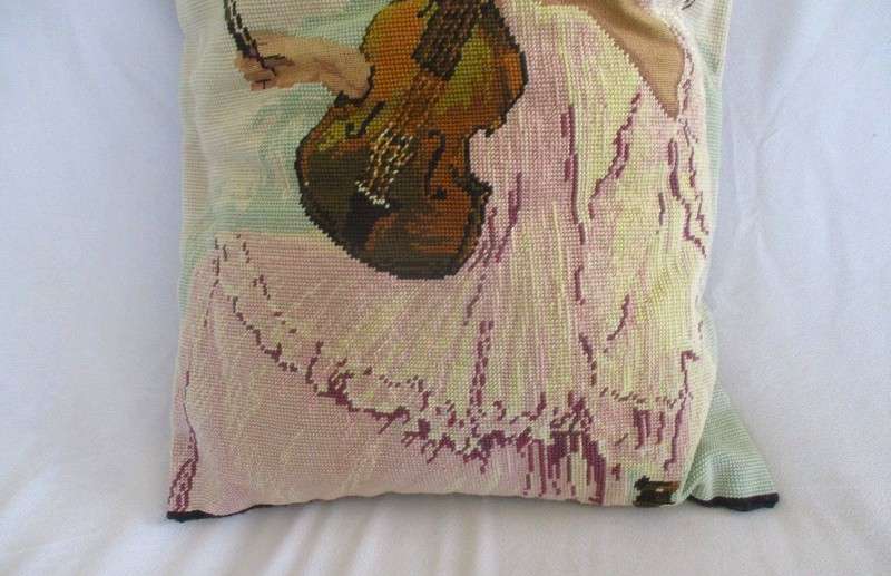 A large hand made cushion combining Petit Point and ordinary tapestry - girl playing violin